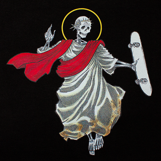 front of a black t-shirt with jesus doing a christ air on his skateboard graphic