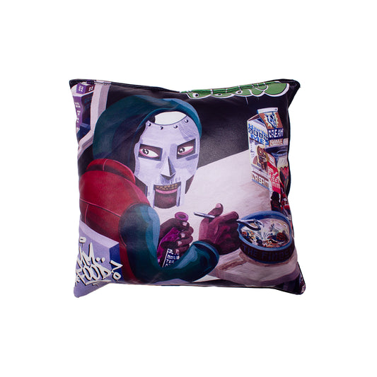 front of a pillow made from MF Doom merch