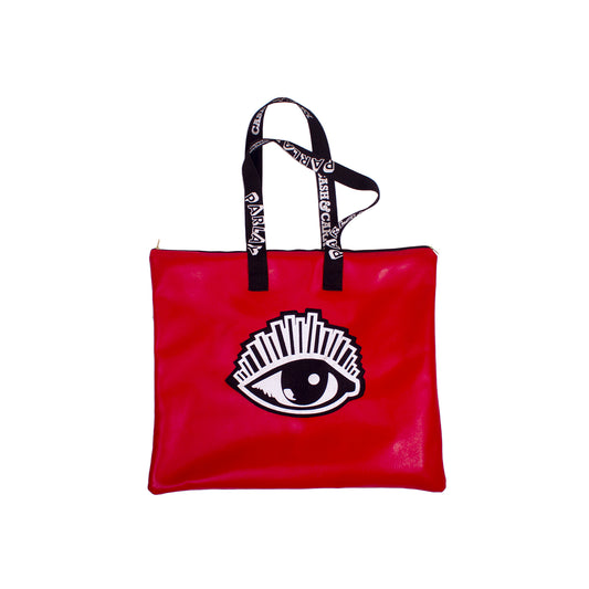 the side of a red over the shoulder bag with eye logo