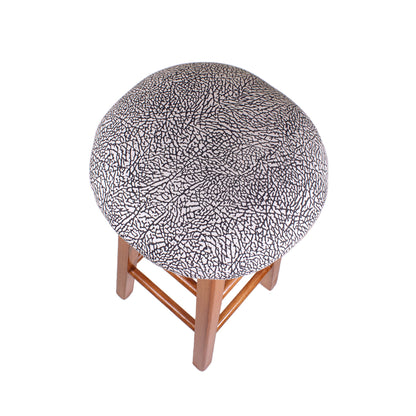 close up of a stool made with elephant print pattern from a vintage Jordan t-shirt