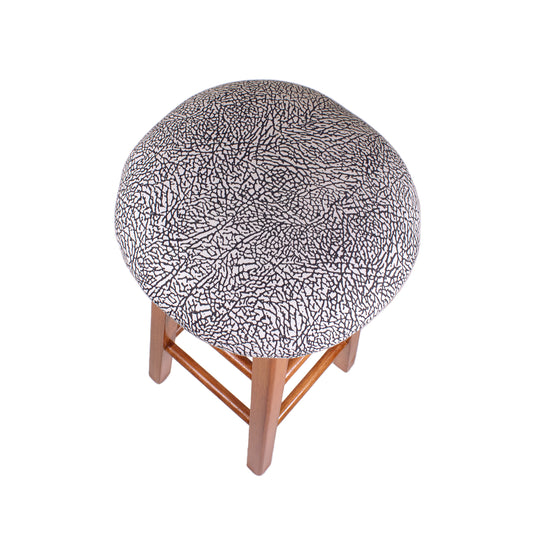 close up of a stool made with elephant print pattern from a vintage Jordan t-shirt